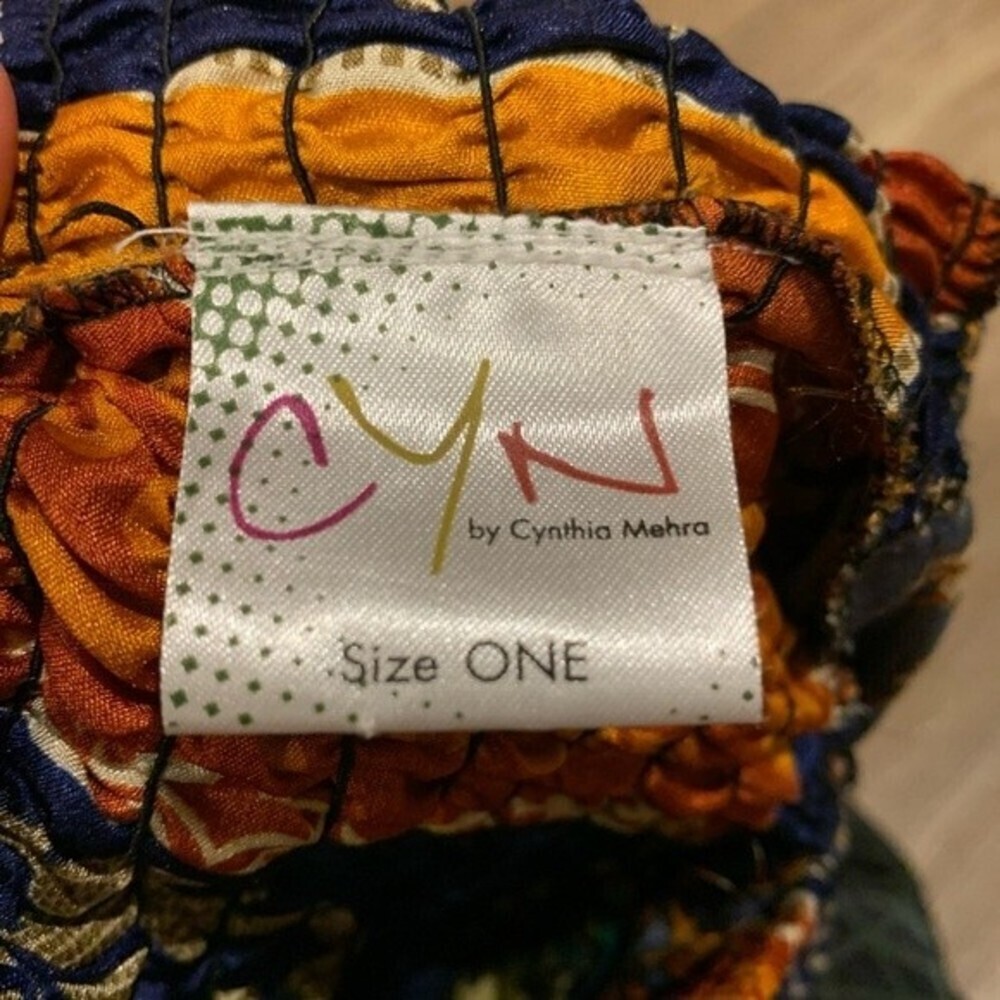Bold patterned shorts. Says one size on tag but fits best on small. - Picture 4 of 4